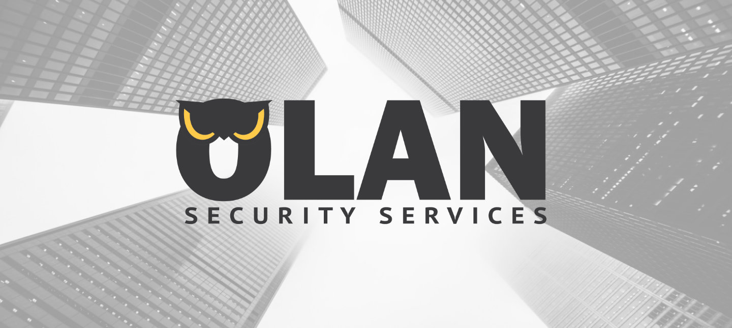 Image of full Olan Security Services logo over a background image of black and white city buildings. Done by Stephanie Reid Designs